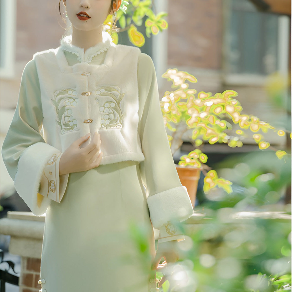 Woman wearing a Classic Republican-Style Qipao Winter Set, featuring retro elements and modern comfort.