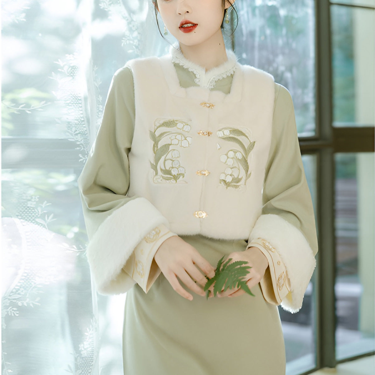 Woman wearing a Classic Republican-Style Qipao Winter Set, featuring retro elements and modern comfort.