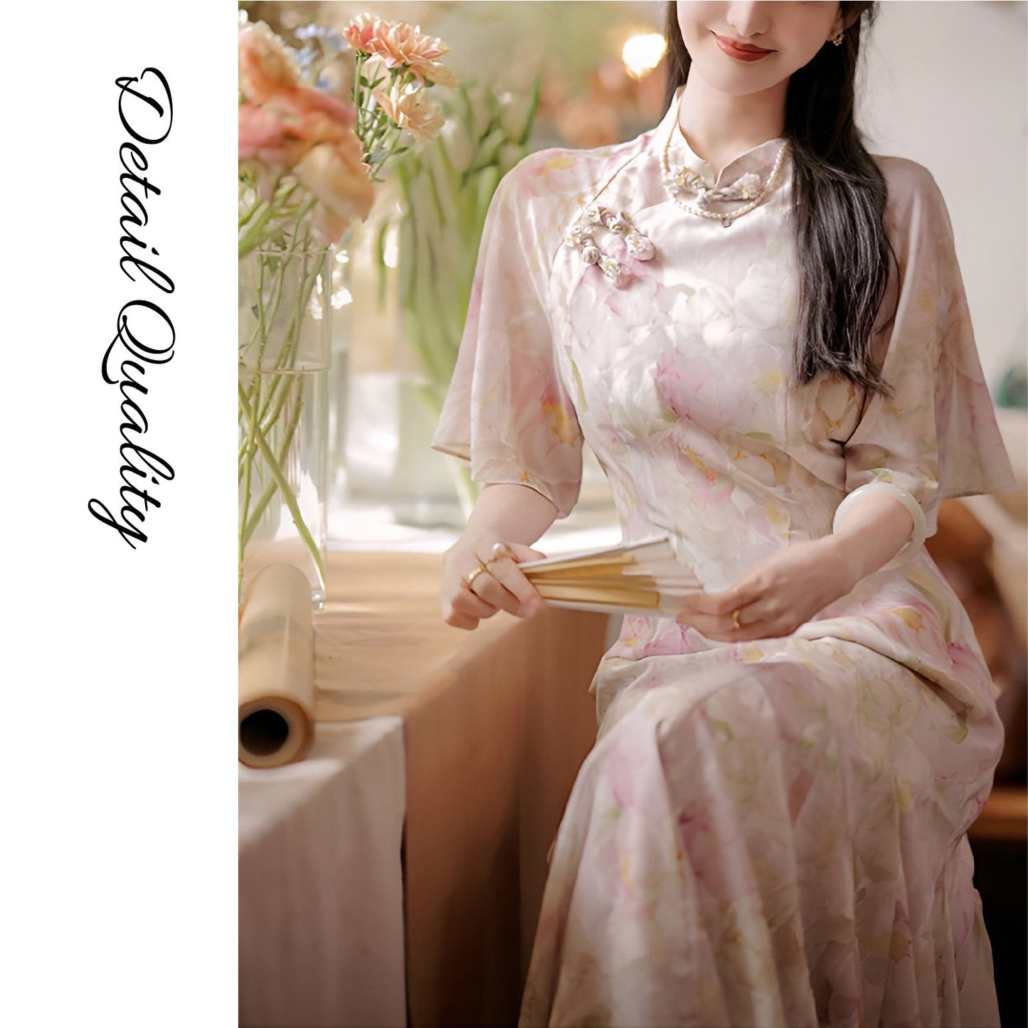 Woman wearing a luxurious modern cheongsam with delicate floral patterns, available in S, M, L.