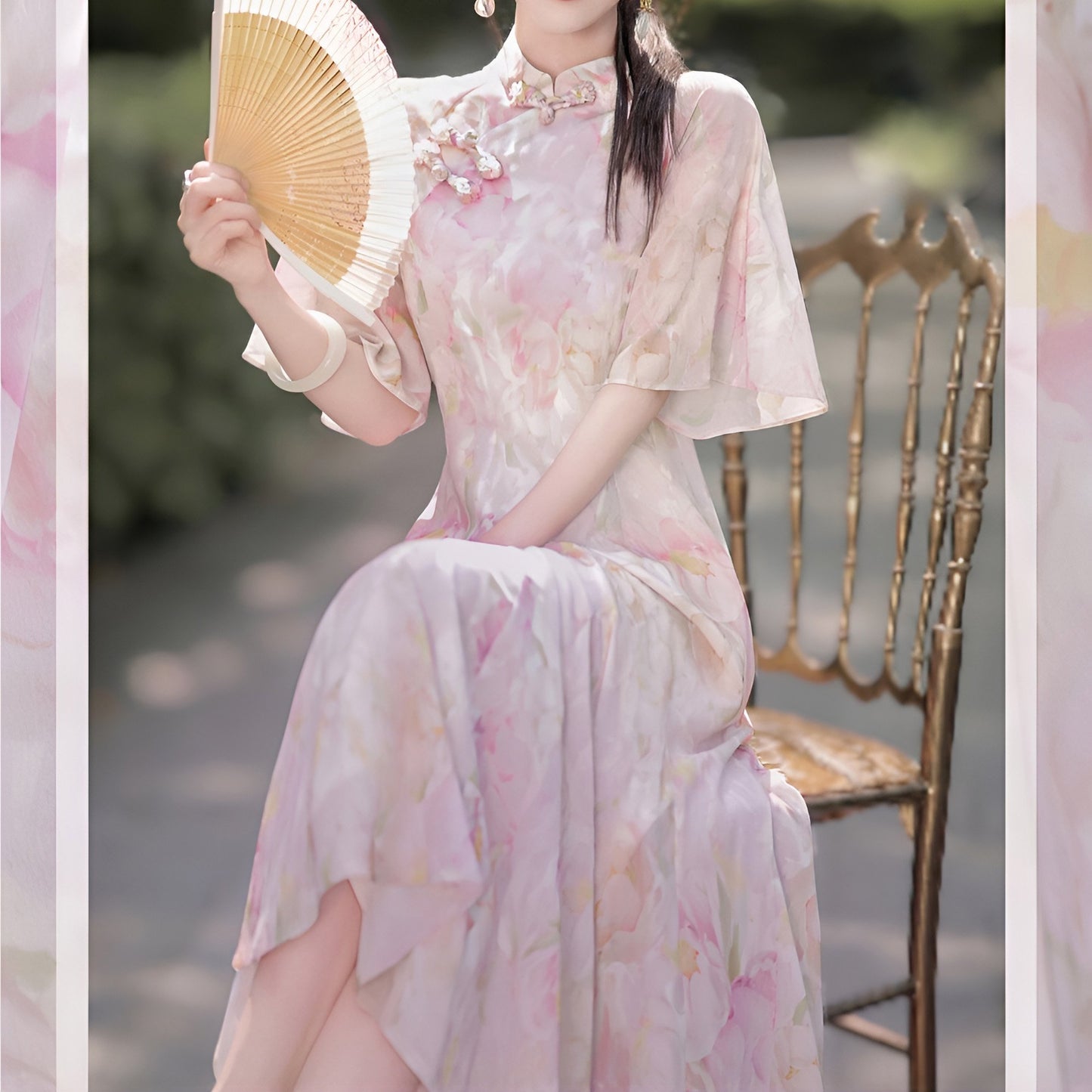Woman wearing a luxurious modern cheongsam with delicate floral patterns, available in S, M, L.