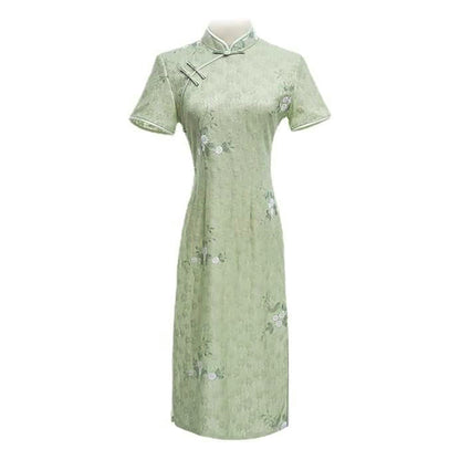 Woman wearing a pastel green modern Cheongsam dress with floral lace embroidery, 