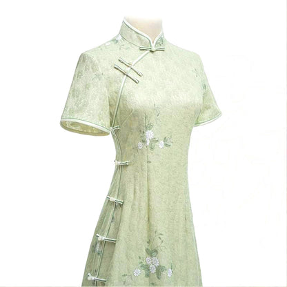 Woman wearing a pastel green modern Cheongsam dress with floral lace embroidery, 