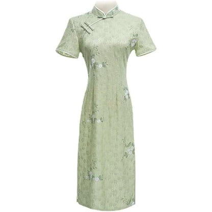 Woman wearing a pastel green modern Cheongsam dress with floral lace embroidery, 